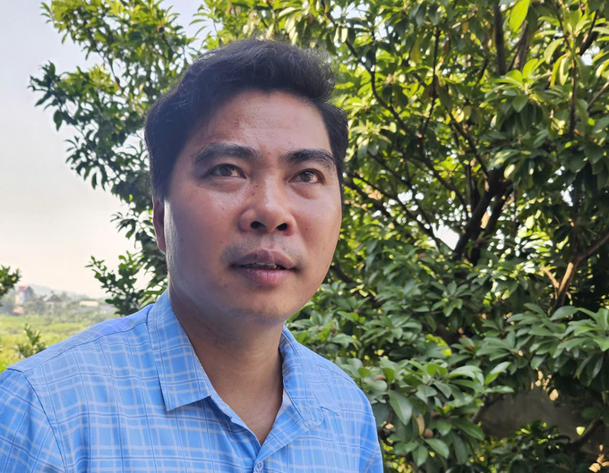 Anh Năng Văn Hiệp, người nuôi lợn hữu cơ ở xã Bồ Lý, huyện Tam Đảo. Ảnh: Hoàng Anh.